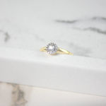 Gull ring rosett med diamanter 0,20ct TW/SI