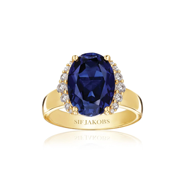 Ring forgylt sølv Ellisse Grande med blå zircon