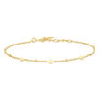 ANIA HAIE gold disc station bracelet.