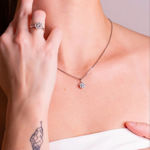 Hvitt gull rosett anheng med diamanter 0,10ct TW/SI