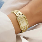 Guess Ladies Bejeweled gullfarget stål 23mm 3atm  skive med blanke steiner og lenke