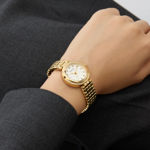 Guess Ladies Bejeweled gullfarget stål 28mm 30 ATM hvit skive